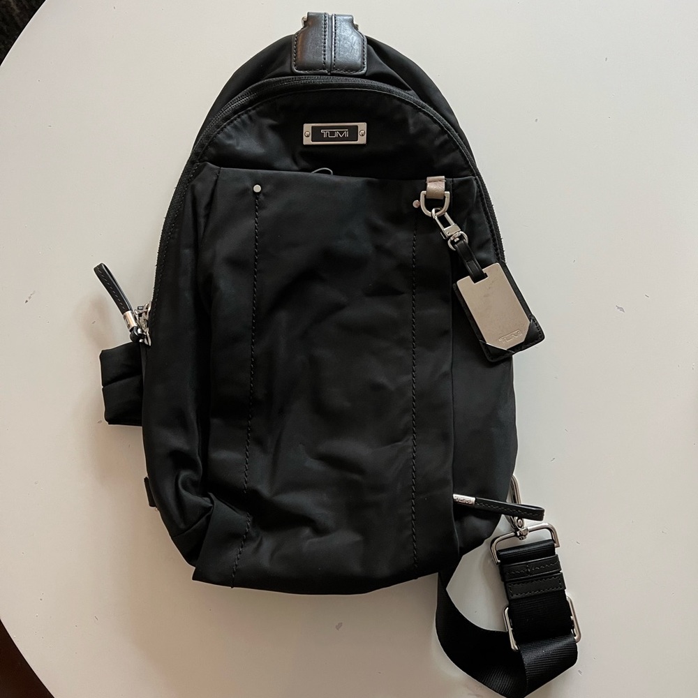 Tumi cross body purse in black